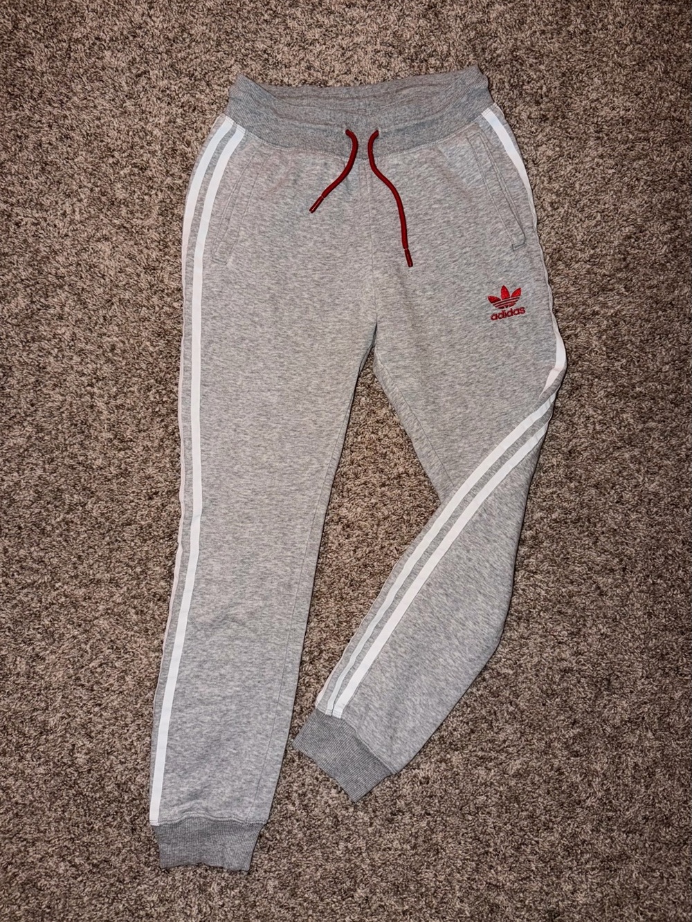 adidas Grey Sweatpants with White Stripes and Red Accents